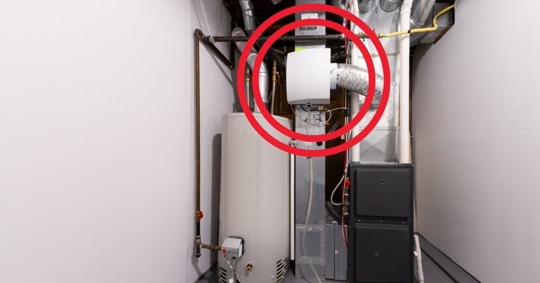 whole-home humidifier installed on a furnace system