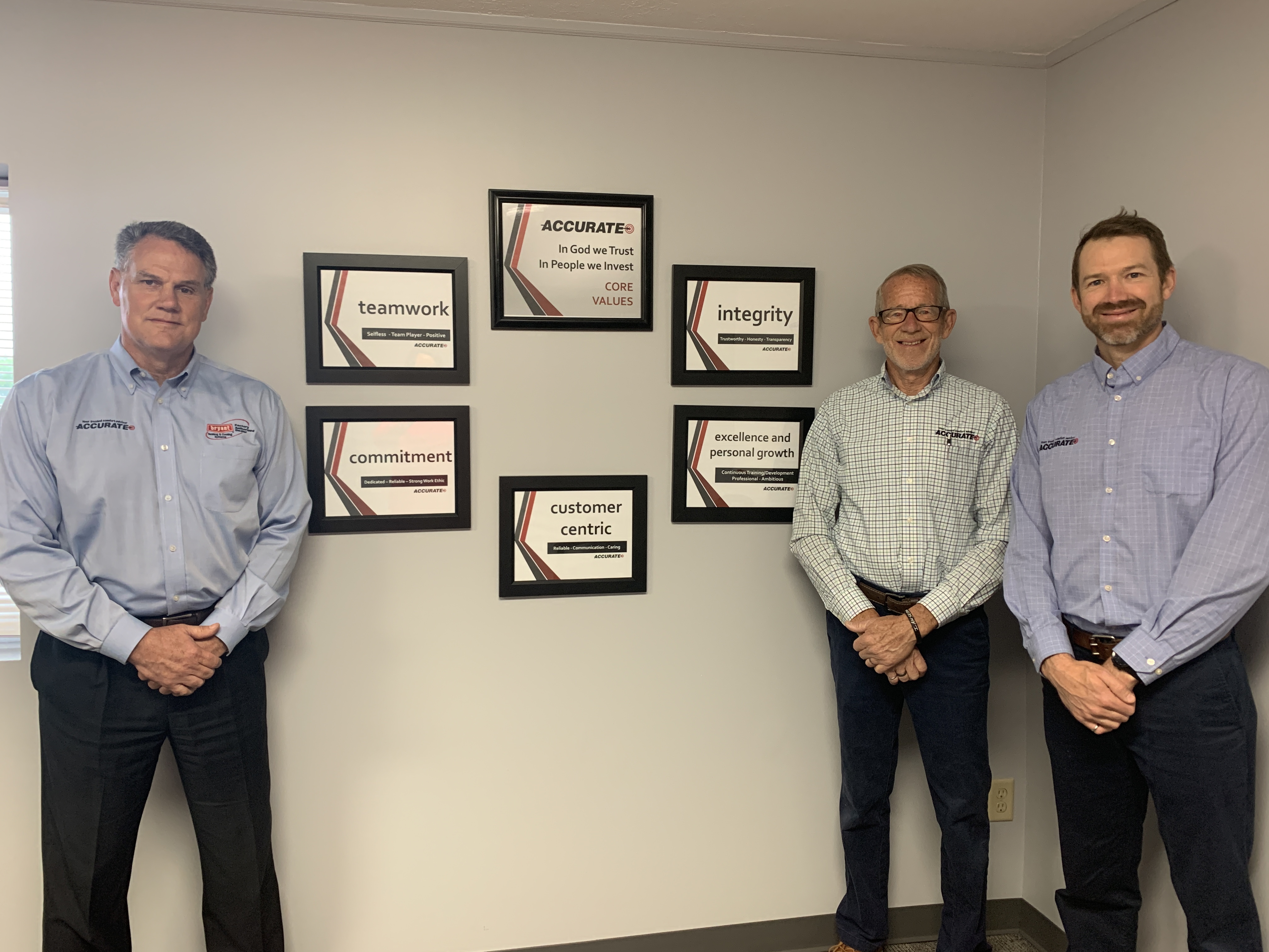 Tom, Brian, Michael standing by our values framed 